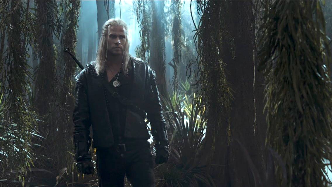 Geralt (Liam Hemsworth) traversing a swamp in The Witcher season 4
