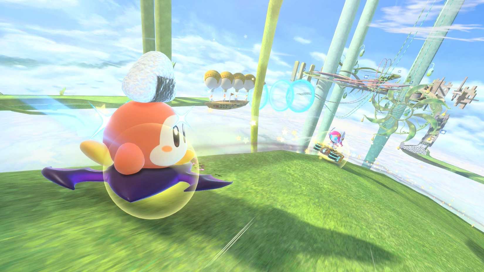 Waddle Dee with a rice ball on her head passes by the robot girl in Kirby Air Riders.