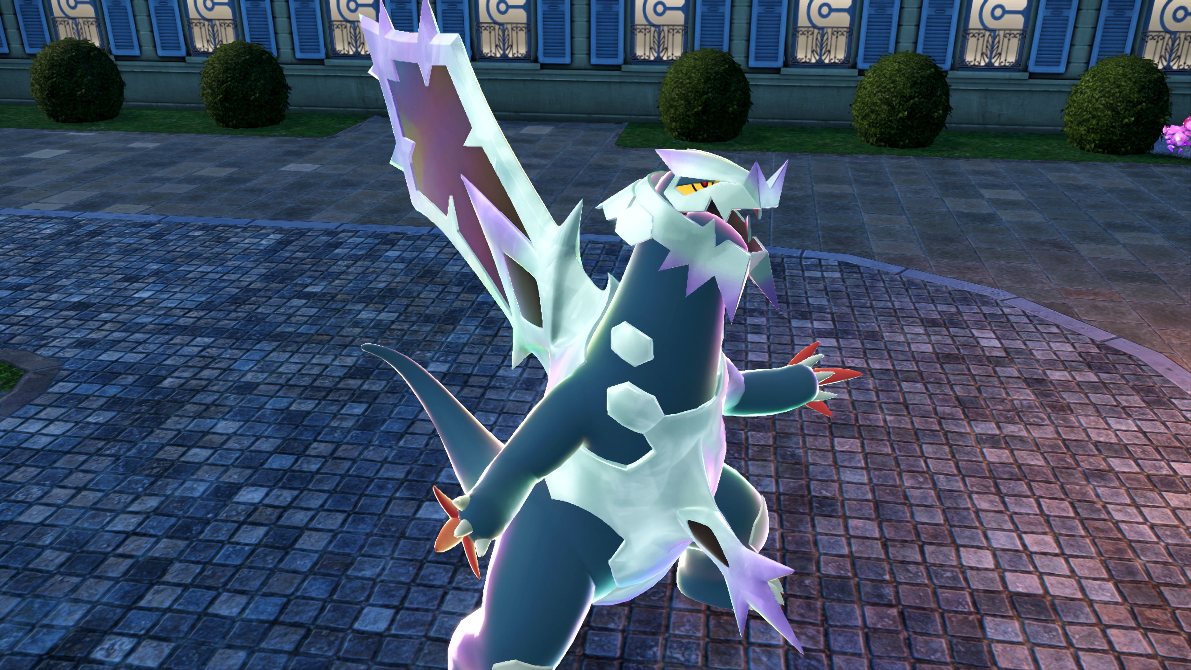 Mega Baxcalibur roaring in a screenshot from the Mega Dimension DLC for Pokemon Legends Z-A.