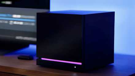 The Steam Machine: a black, cube-shaped console-PC hybrid with an LED strip at the bottom.