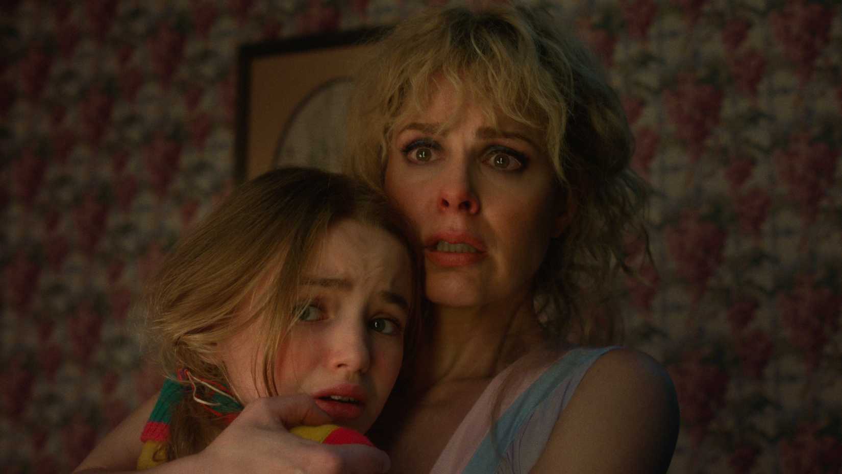 Karen Wheeler holds Holly Wheeler in Stranger Things season 5
