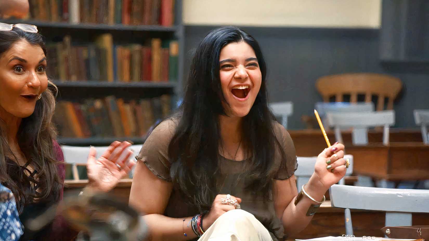 Ms. Marvel actress Iman Vellani reacts with shock to a moment in Tales From Woodcreek.