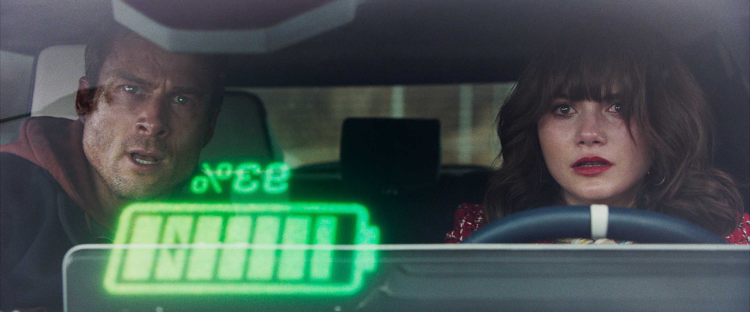 Glen Powell hijacks a self-driving car in The Running Man and kidnaps its owner