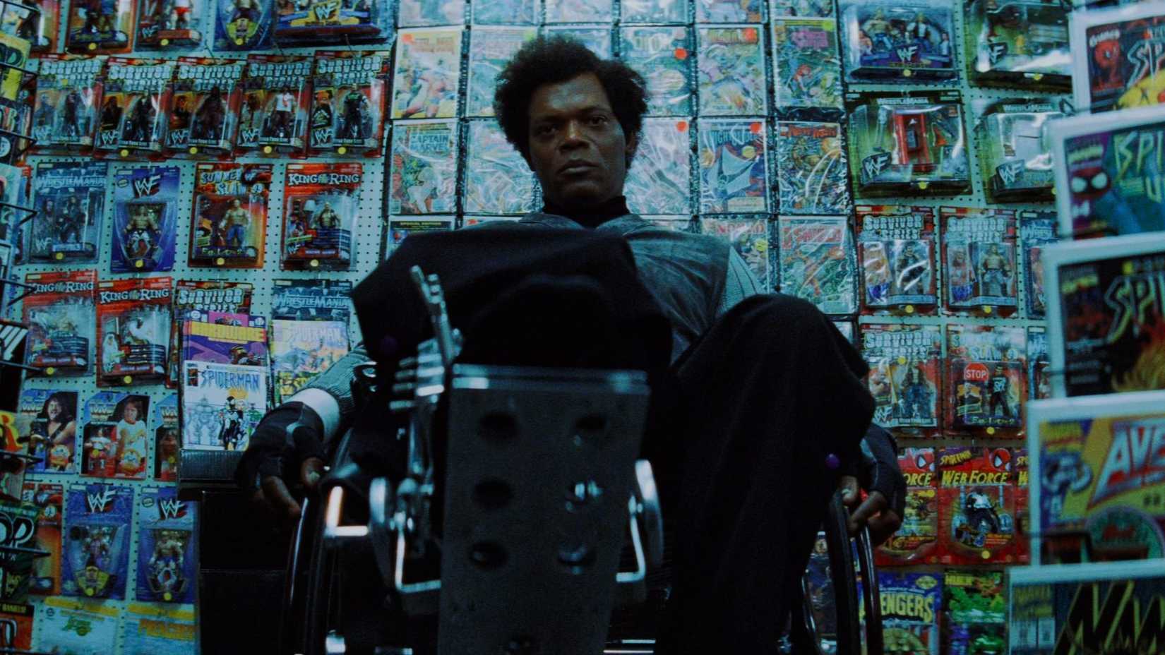 Samuel L. Jackson (Elijah) sitting in a comic book store in Unbreakable