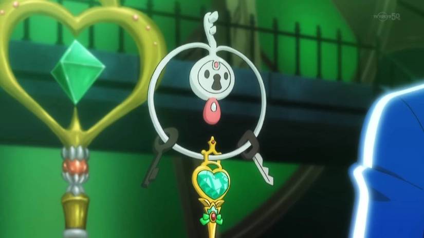 Klefki in the Pokemon anime with a bejeweled key at the bottom of its ring.