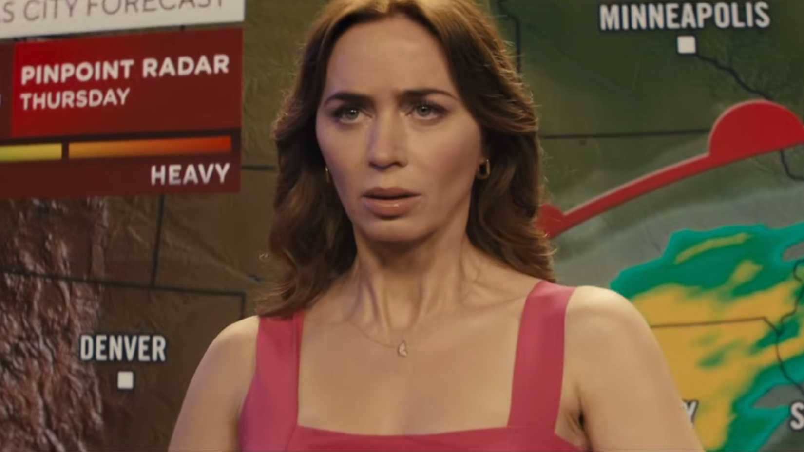 Emily Blunt as a weatherperson in the Disclosure Day trailer