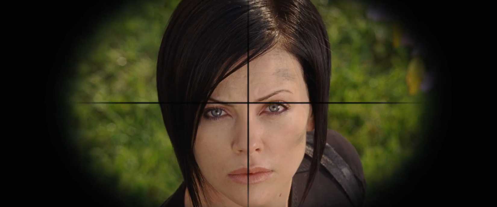 In a scene from the sci-fi movie Aeon Flux, Charlize Theron's character appears in a sniper's crosshairs, much as the movie was targeted by critics and audiences in its initial release