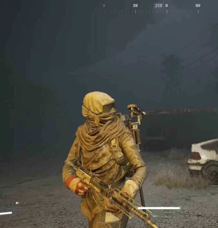  a wraparound scarf, sand goggles, and a tunic, all yellowy-brown.