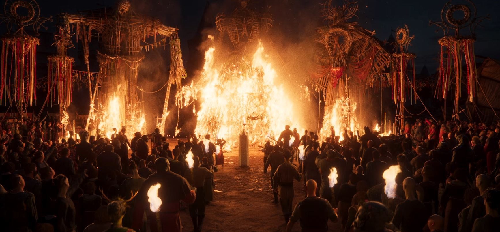 An effigy burns in Divinity.