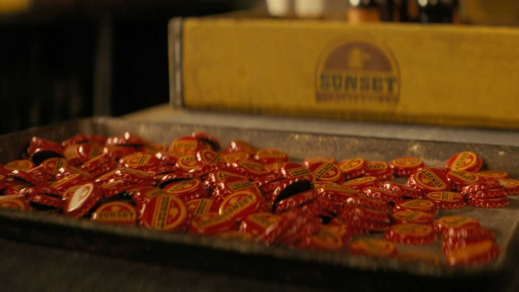 A tray of Sunset Sarsaparilla caps in the Fallout TV show.