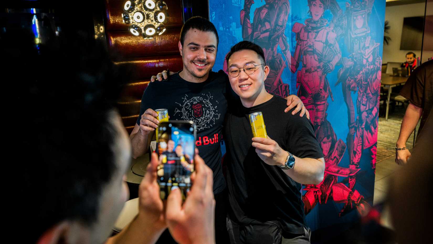 Hal takes a photo with a fan.