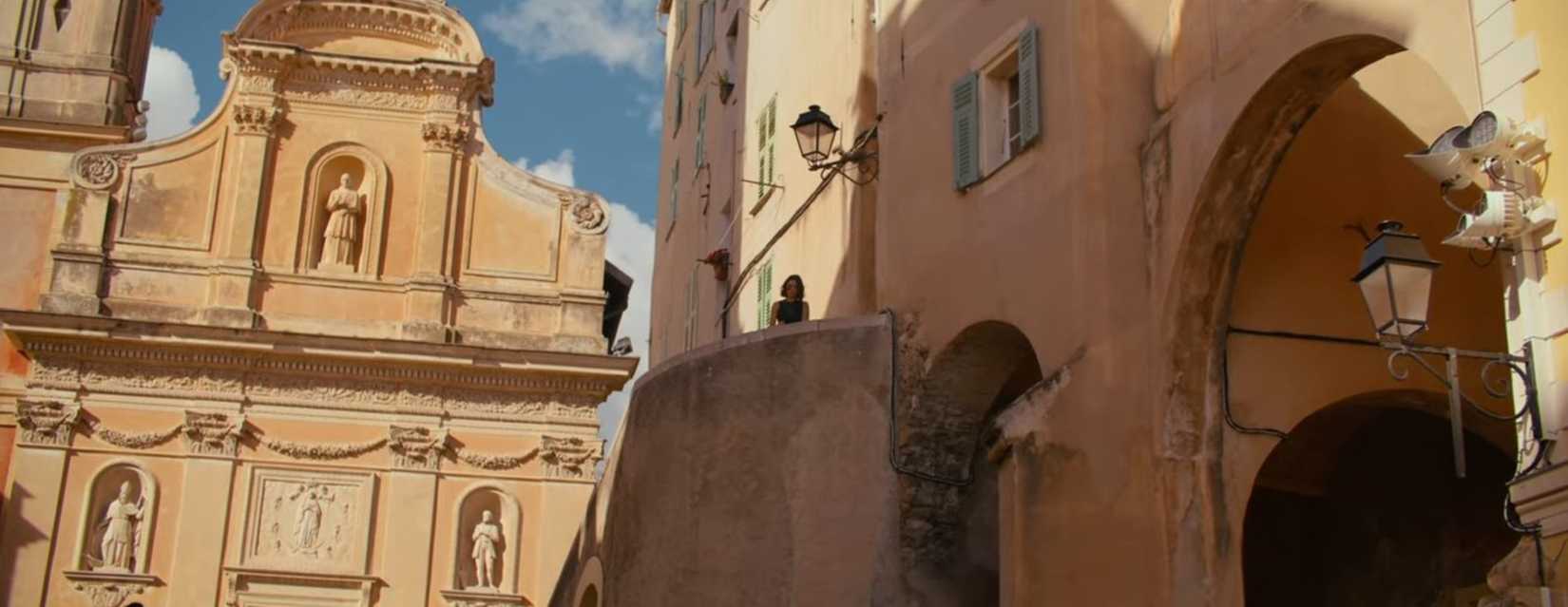 A wide shot of CW (Cassandra Naud) watching one of her possible victims, showing off the real Bali location used in the movie Influencer.