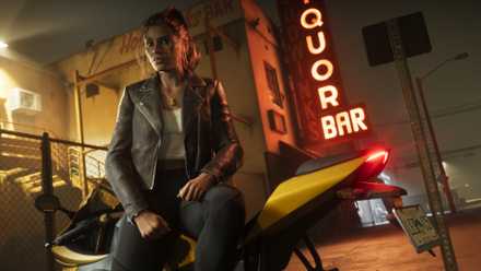 Lucia Caminos sites on a motorcycle outside of a bar in a still from Grand Theft Auto 6