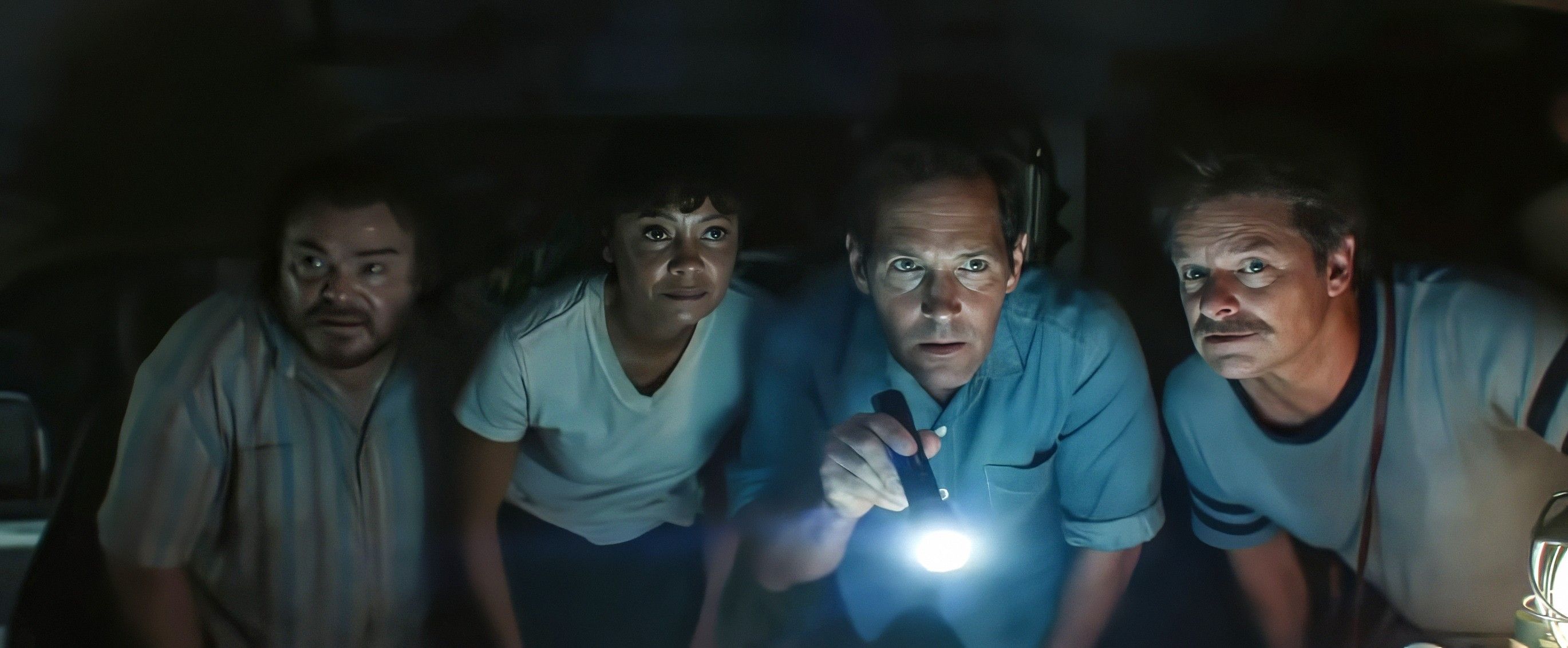 The cast of Anaconda navigating the jungle