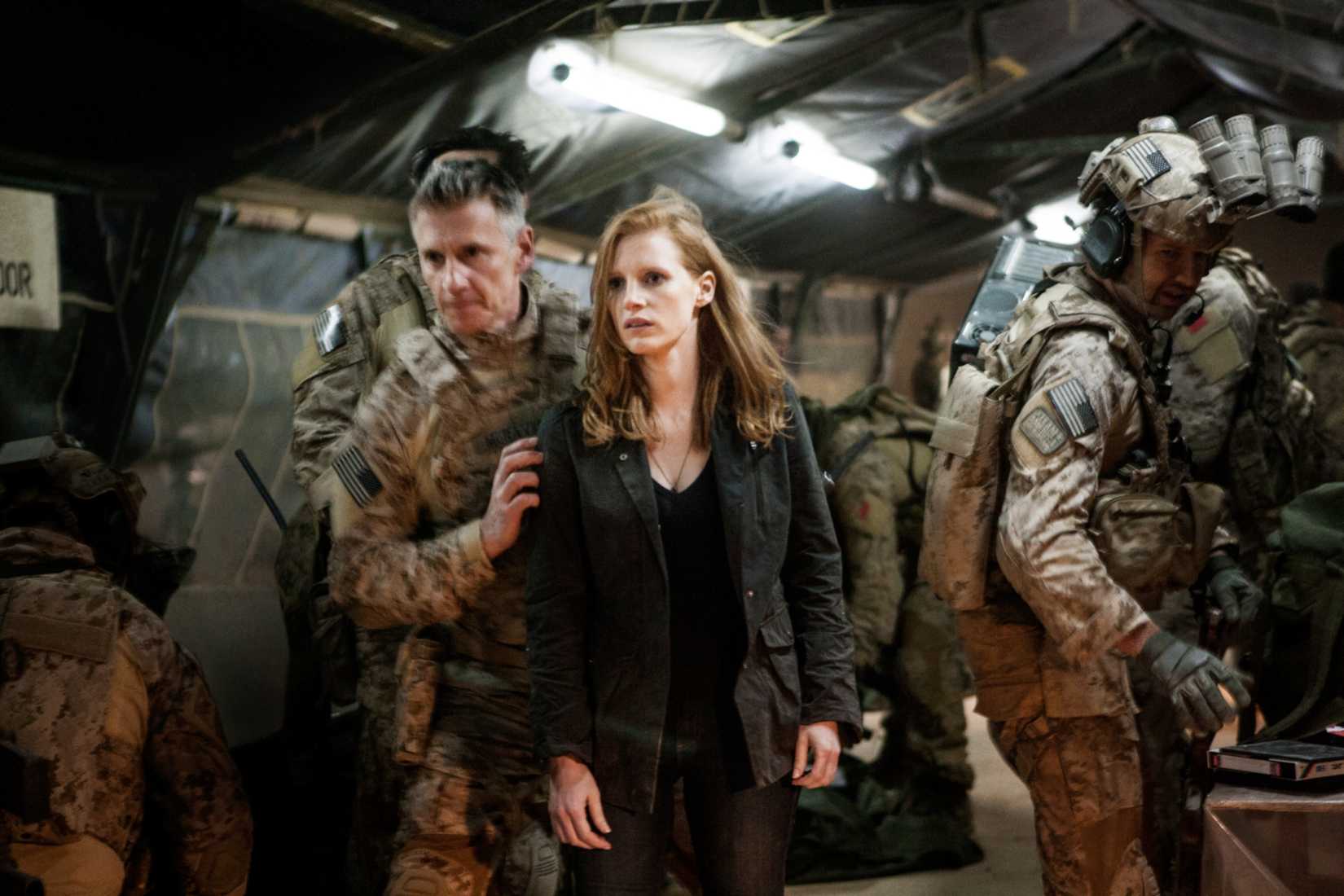 Maya (Jessica Chastain) gets rushed off a military helicopter in Zero Dark Thirty