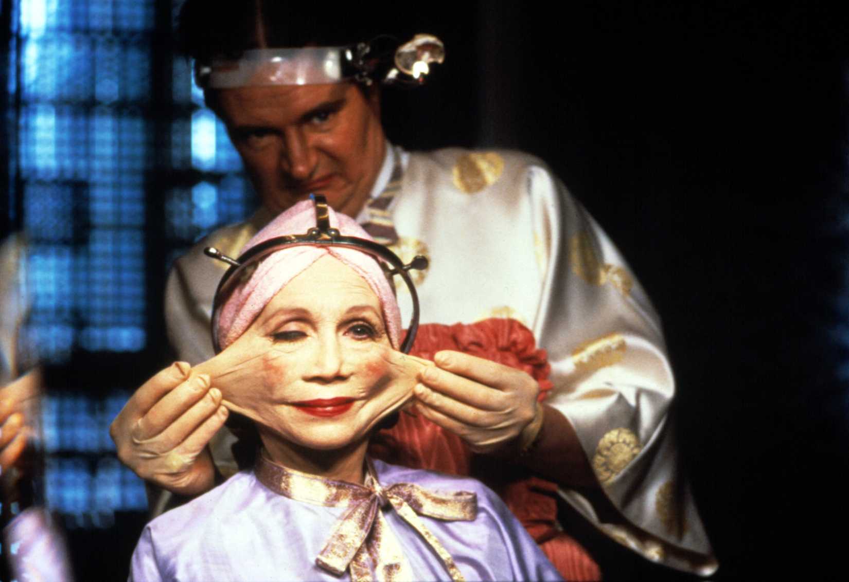 Katherine Helmond as Mrs. Ida Lowry undergoing an unsettling beauty treatment