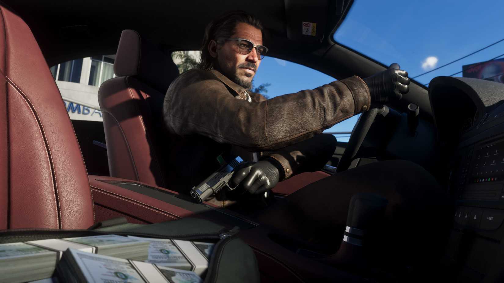 Raul Bautista holds a gun in the drivers seat of his car in Grand Theft Auto 6