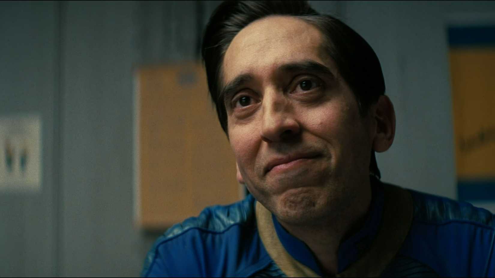 Reg McPhee frowns slightly in the first episode of Fallout season 2.