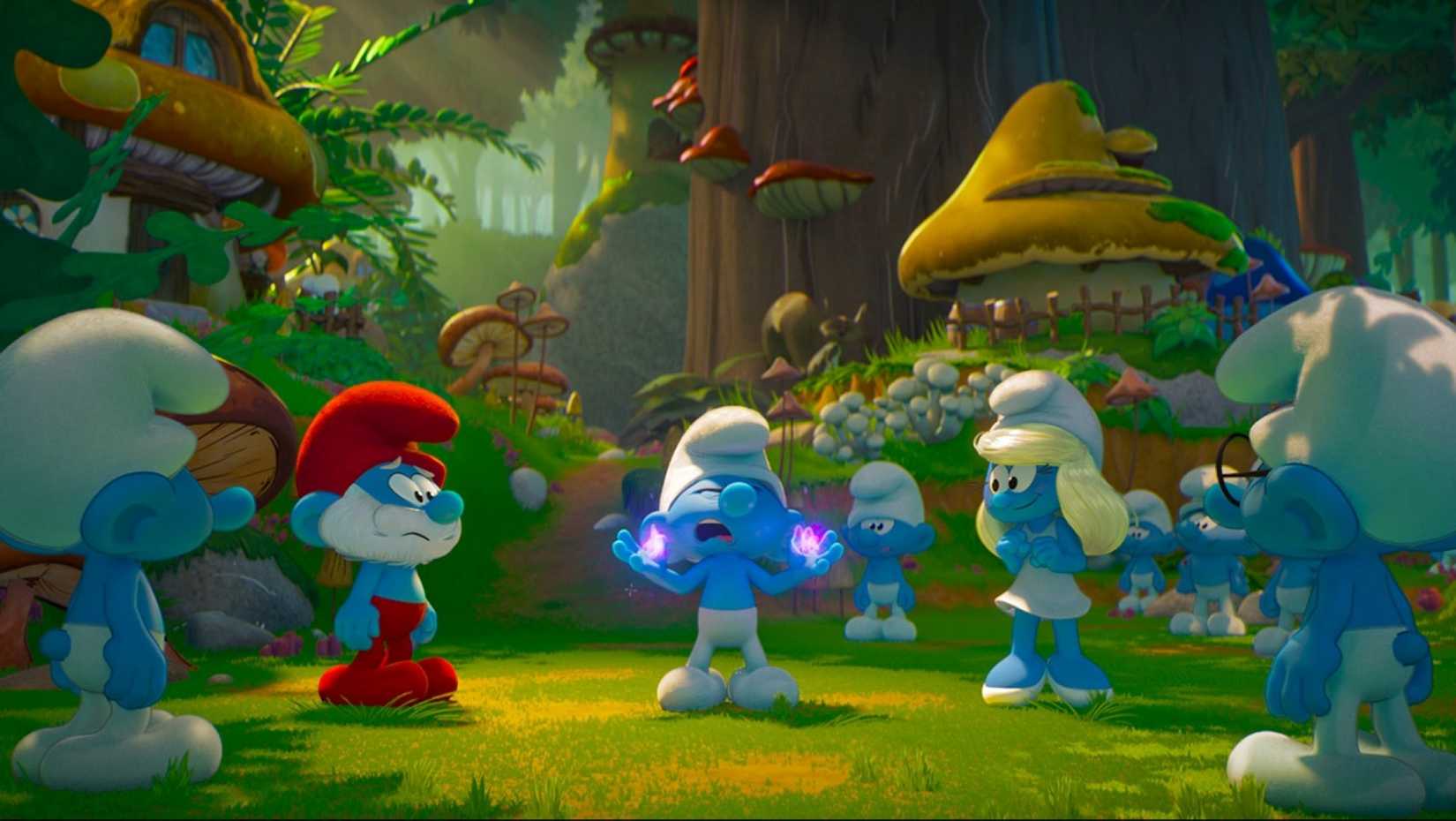 A Smurf cries out in anguish while surrounded by other Smurfs, in a representative scene from the movie Smurfs