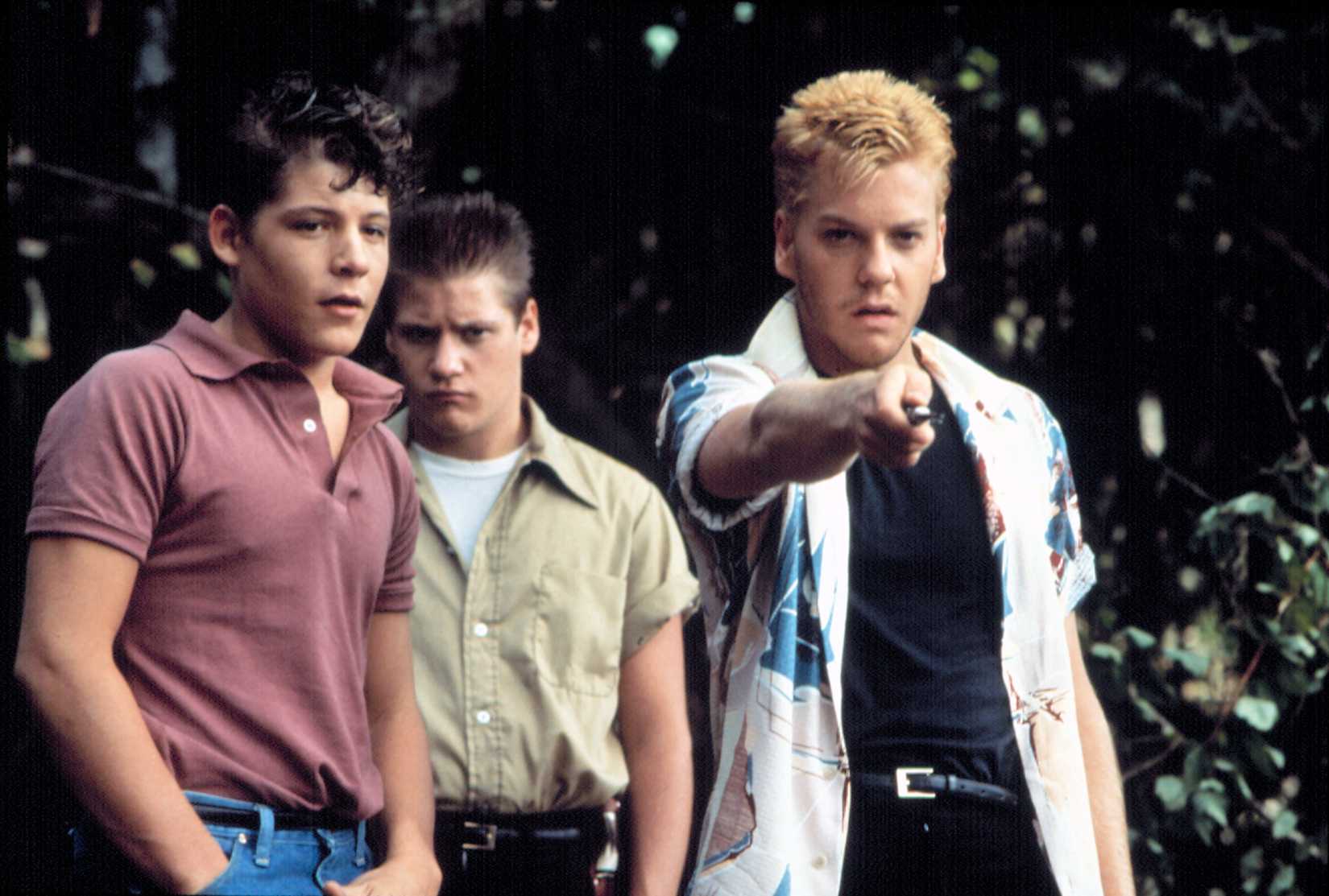 Kiefer Sutherland points a knife menacingly in Stand by Me