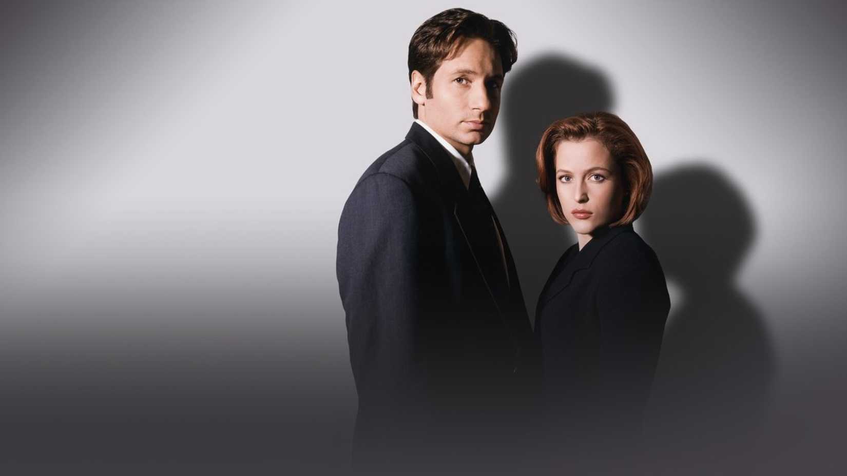 The X-Files promo image showing Mulder and Scully together on a white background
