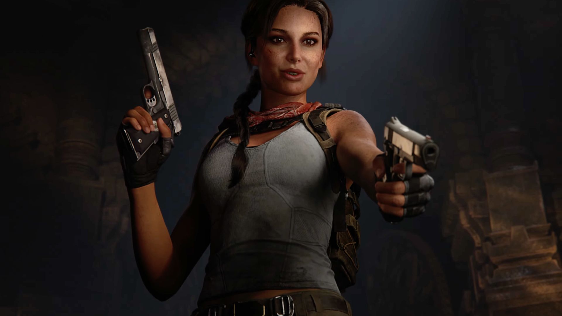 Lara Croft aims two pistols at an enemy, smiling.