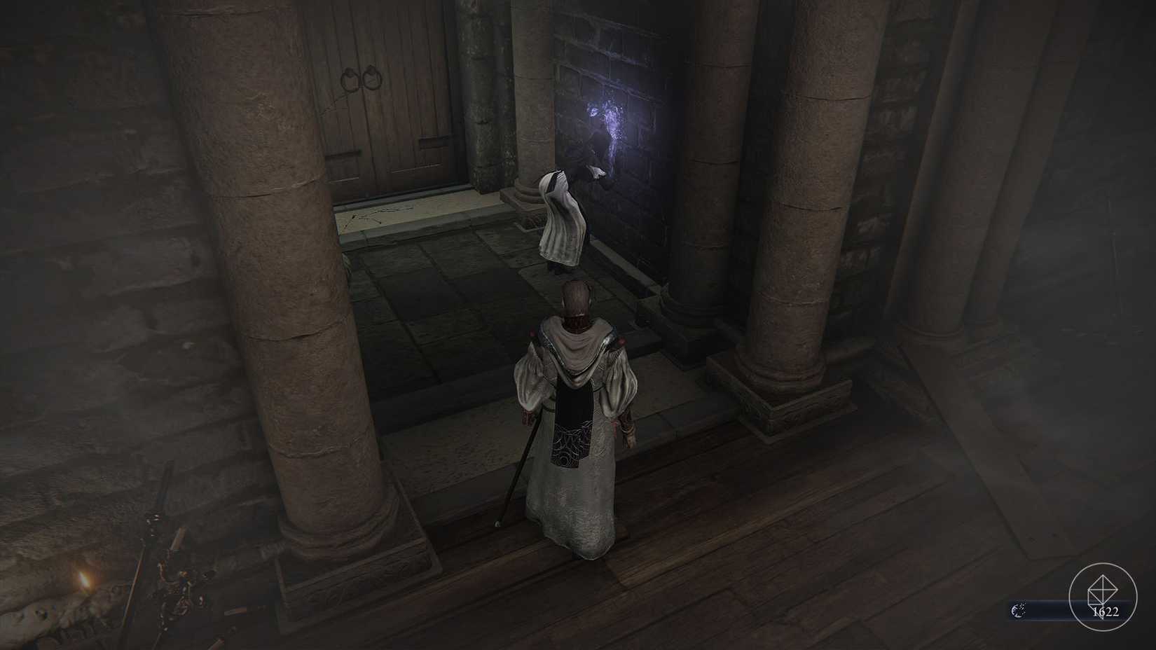 The Undertaker licking something off of the wall in the chapel in Elden Ring Nightreign.