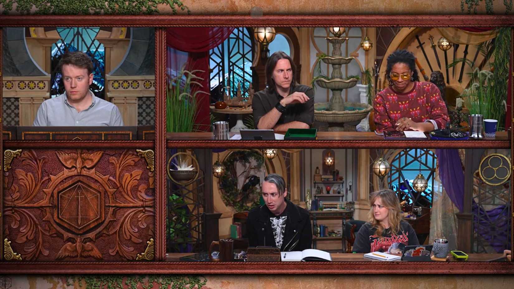 An image from Critical Role Campaign 4, episode 12. It features Brennan Lee Mulligan, Matthew Mercer, Aabria Iyengar, Alexander Ward, and Ashley Johnson among a fantasy-esque background.