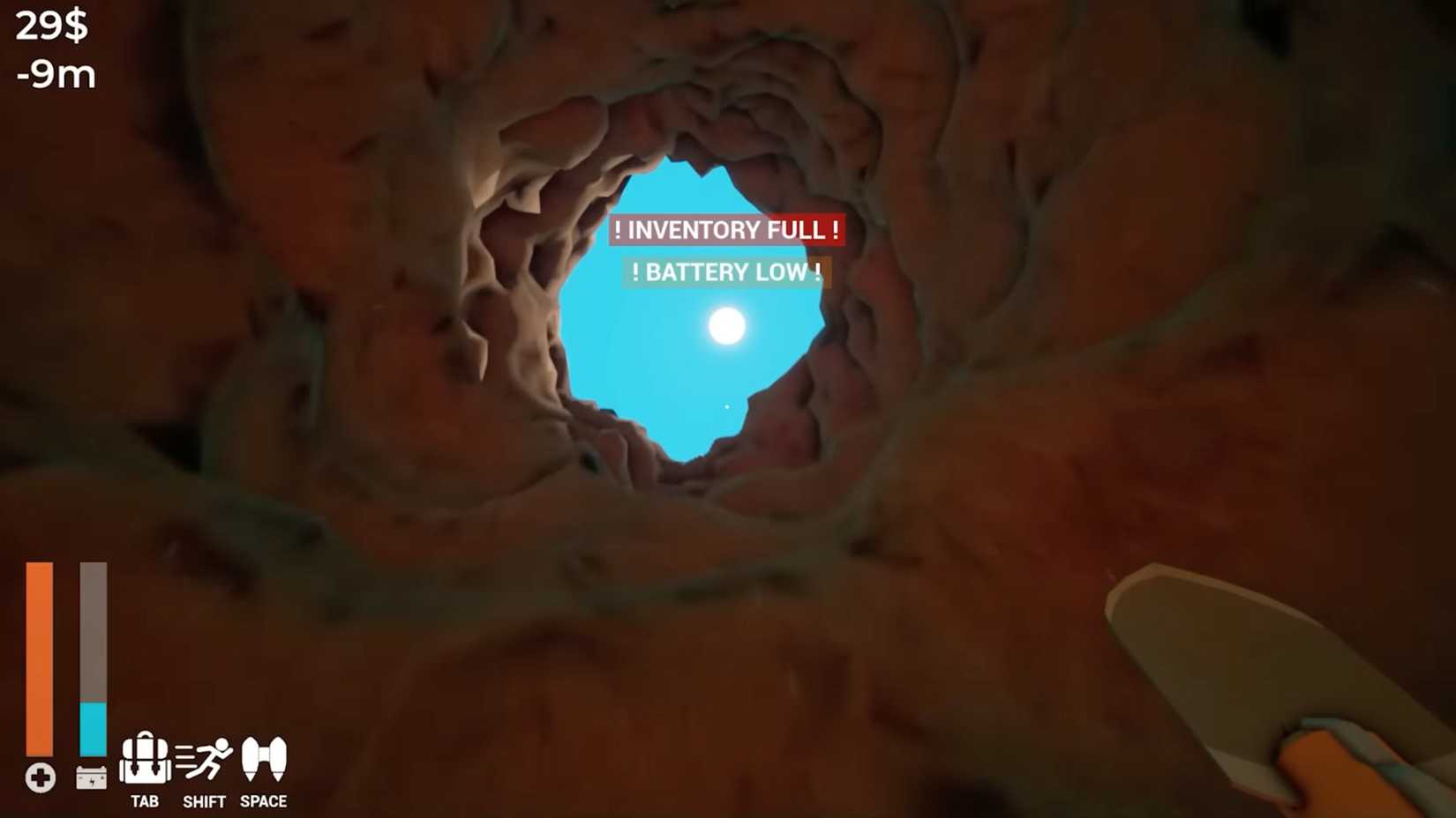 The player attempts to escape the hole with a low battery that could soon explode.