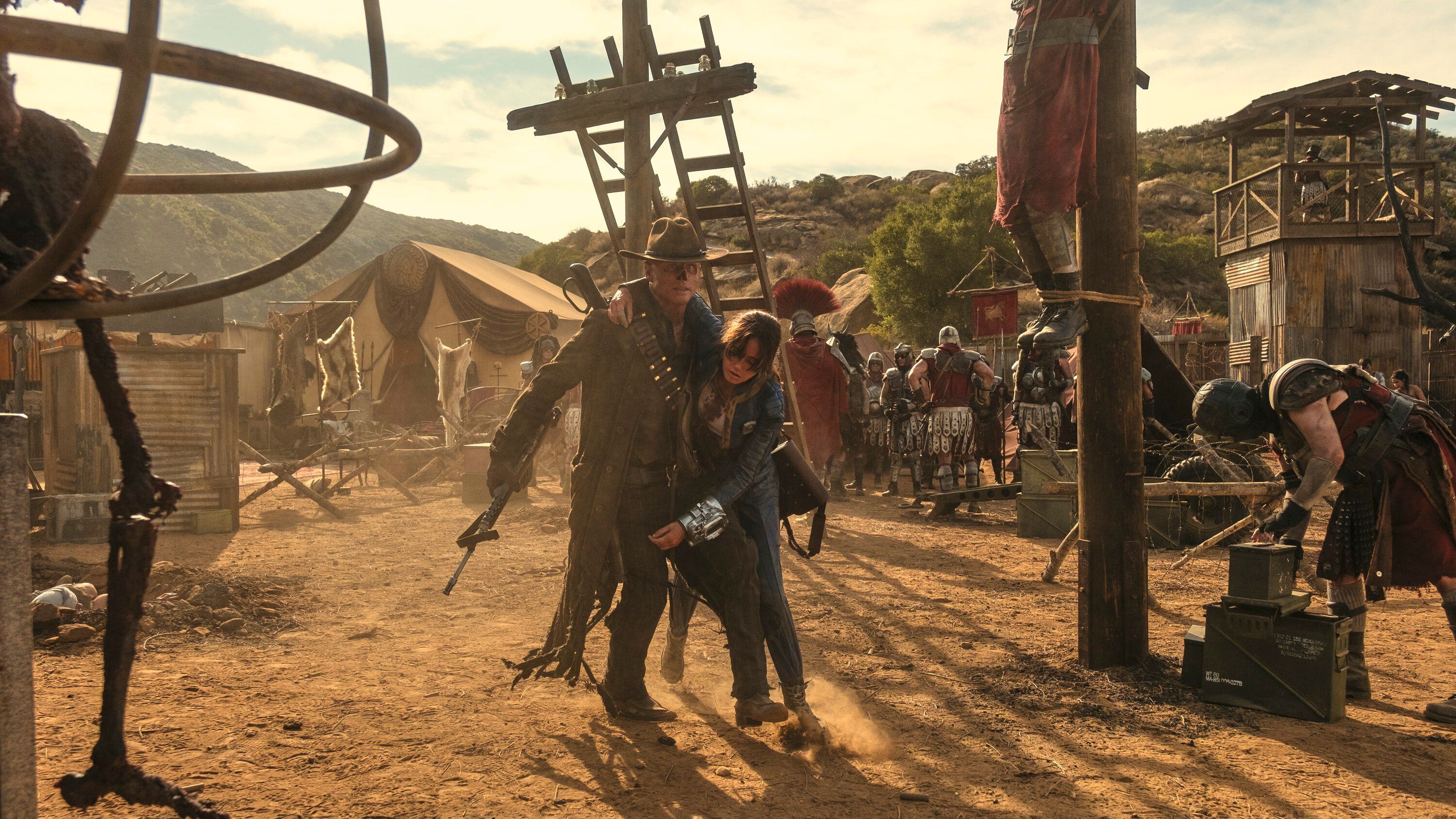 The Ghoul (Walton Goggins) rescues Lucy MacLean (Ella Purnell) from Caesar's Legion in Fallout season 2