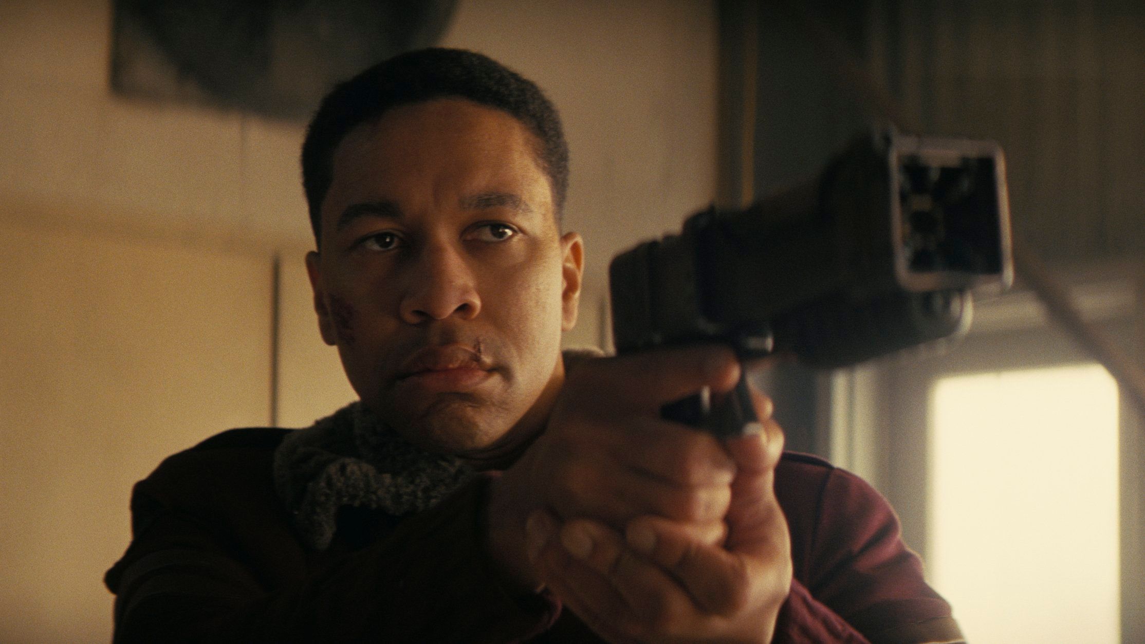 Maximus points a gun in Fallout season 2