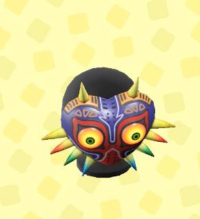 A colorful heart-shaped mask with spikes coming out of it in ACNH