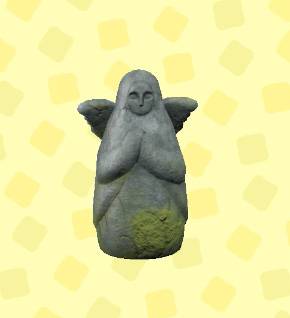 A statue of a round goddess with small wings in ACNH