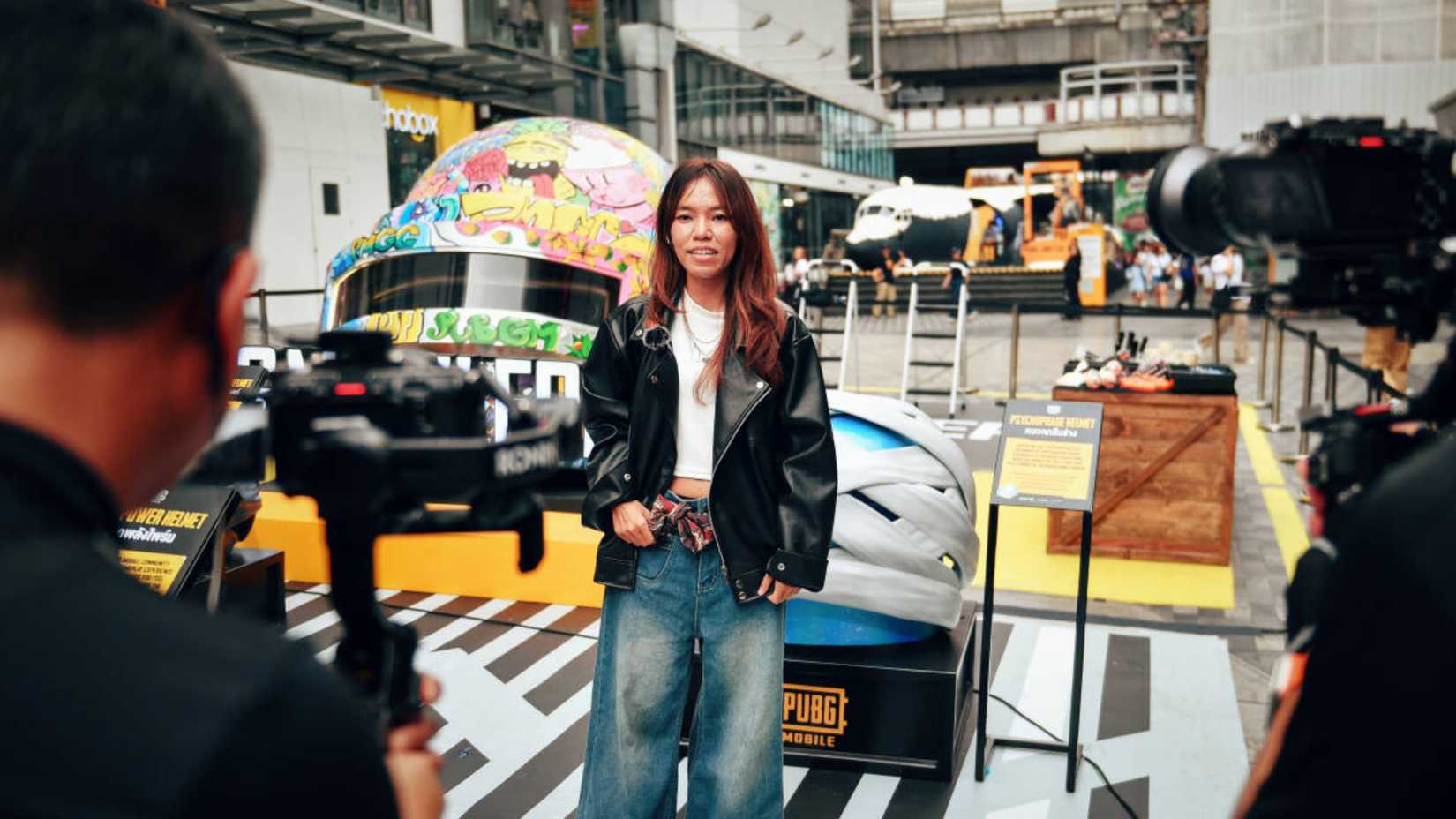 pubg mobile pdp creator holding a mic.