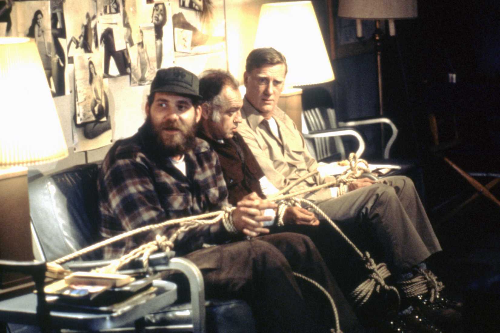 MacReady ties the researchers up for the blood test in 2011's The Thing