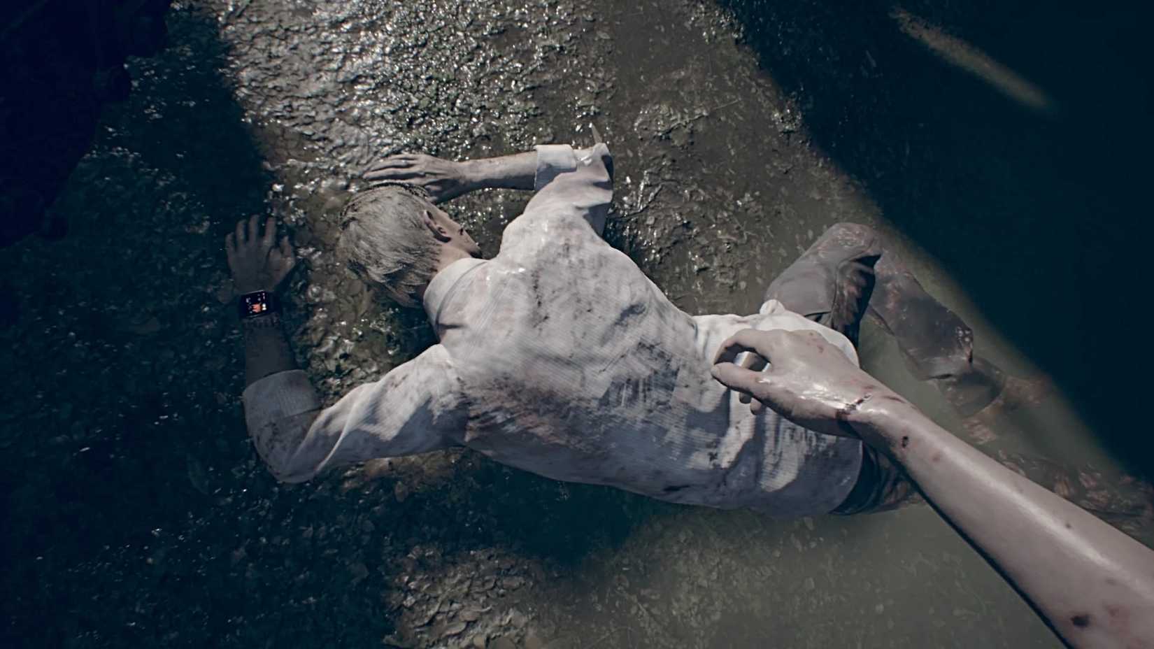Ethan Winters lying facedown in mud in Resident Evil 7