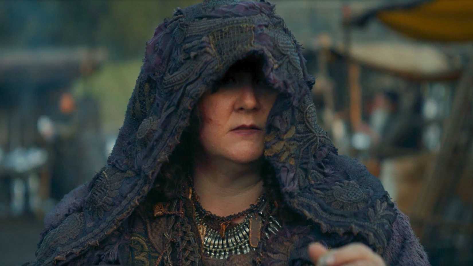 An image from A Knight of the Seven Kingdoms. It shows a woman with a cowl over her face.