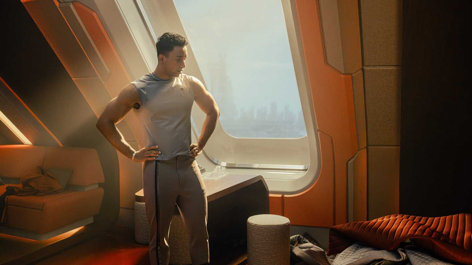 Caleb Mir (Sandro Rosta) looks at his messy dorm room in Starfleet Academy