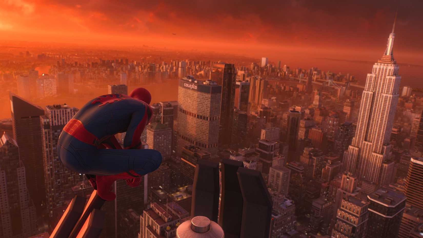 Peter stands on a tower and looks out at Spider-Man 2's open world