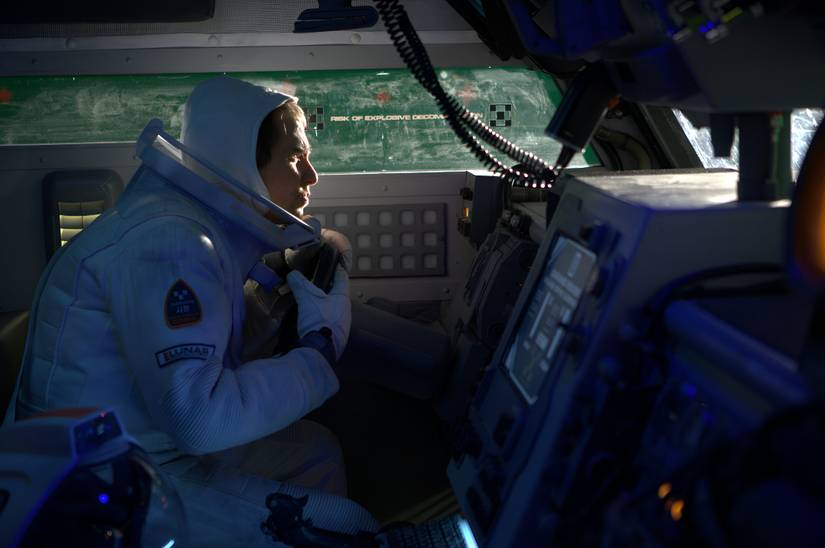 Sam hallucinates before crashing his moon rover in Moon