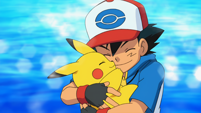 A young boy holds a small yellow Pokémon (Pikachu) in his arms in the Pokémon anime