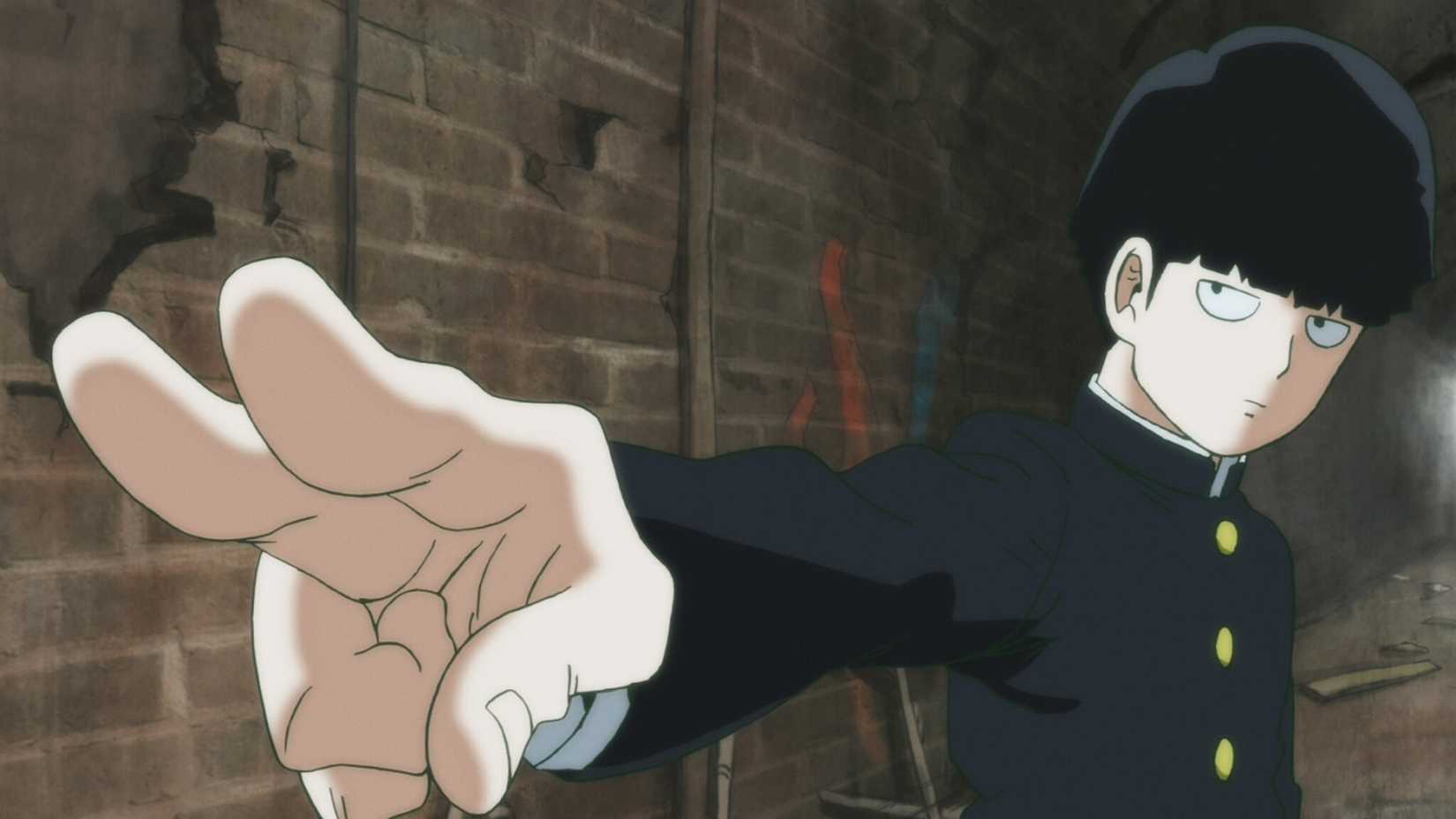 Mob poses with his fingers extended in Mob Psycho 100