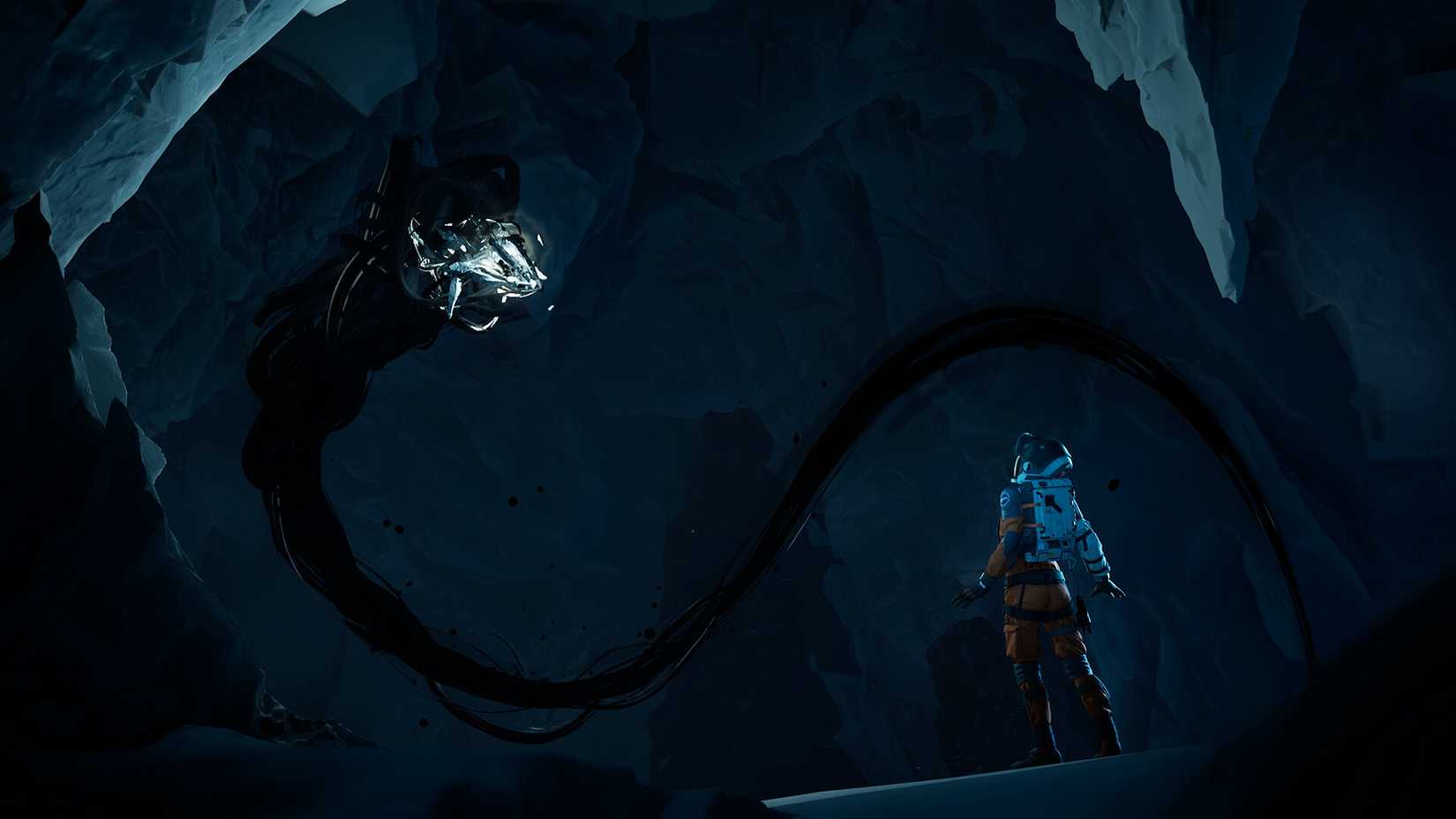 Ariane stands in front of the creature in a cave in Aphelion