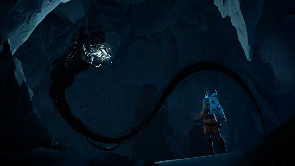 Ariane fica na frente da criatura em uma caverna em Aphelion