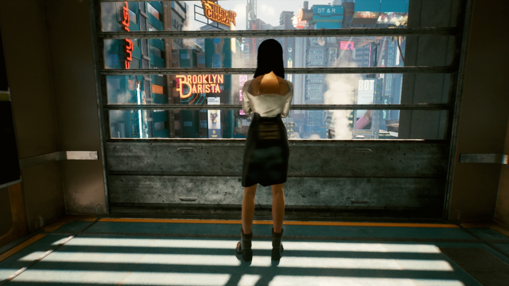 The protagonist V stands alone in a futuristic setting