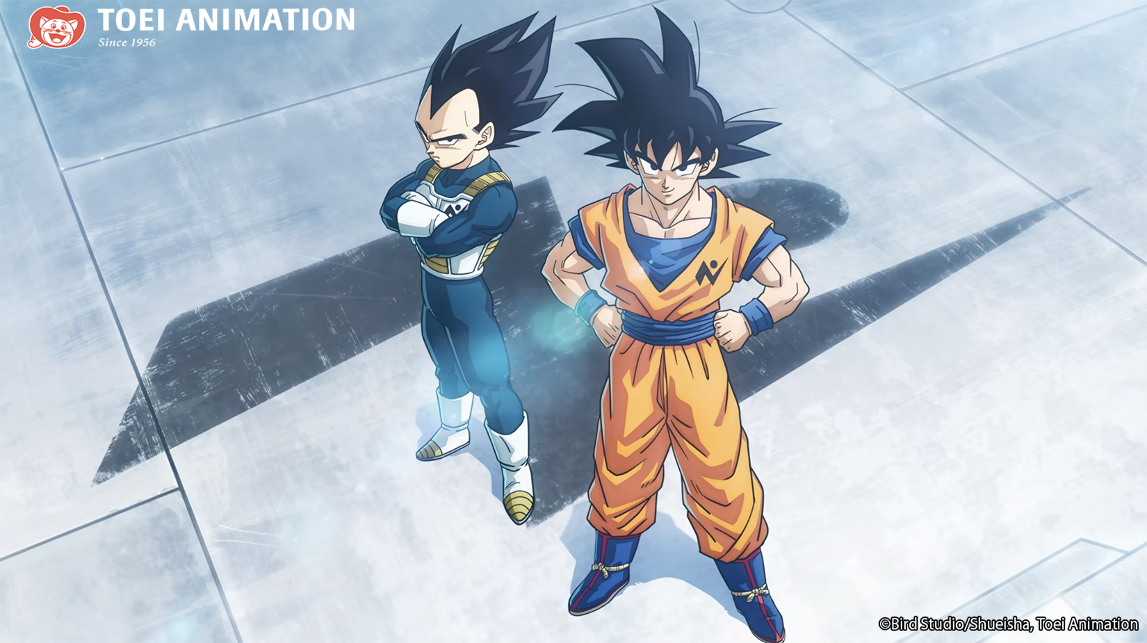 Goku and Vegeta standing, with the Galactic Patrol symbol on their uniform