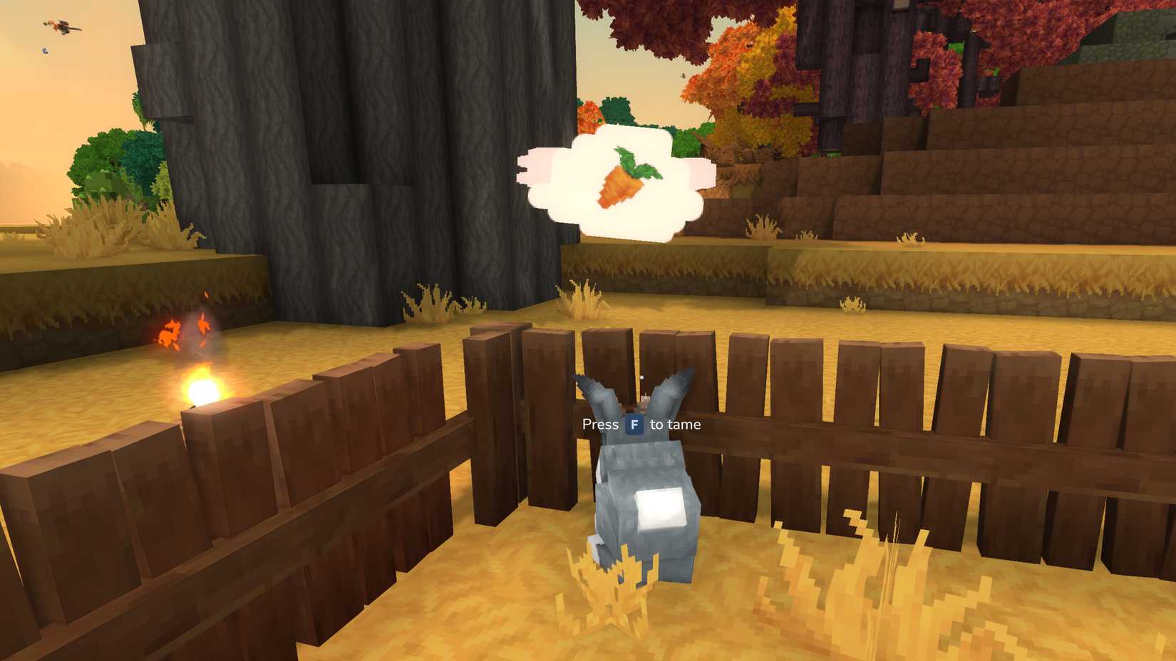 A player tries to tame a rabbit in Hytale.