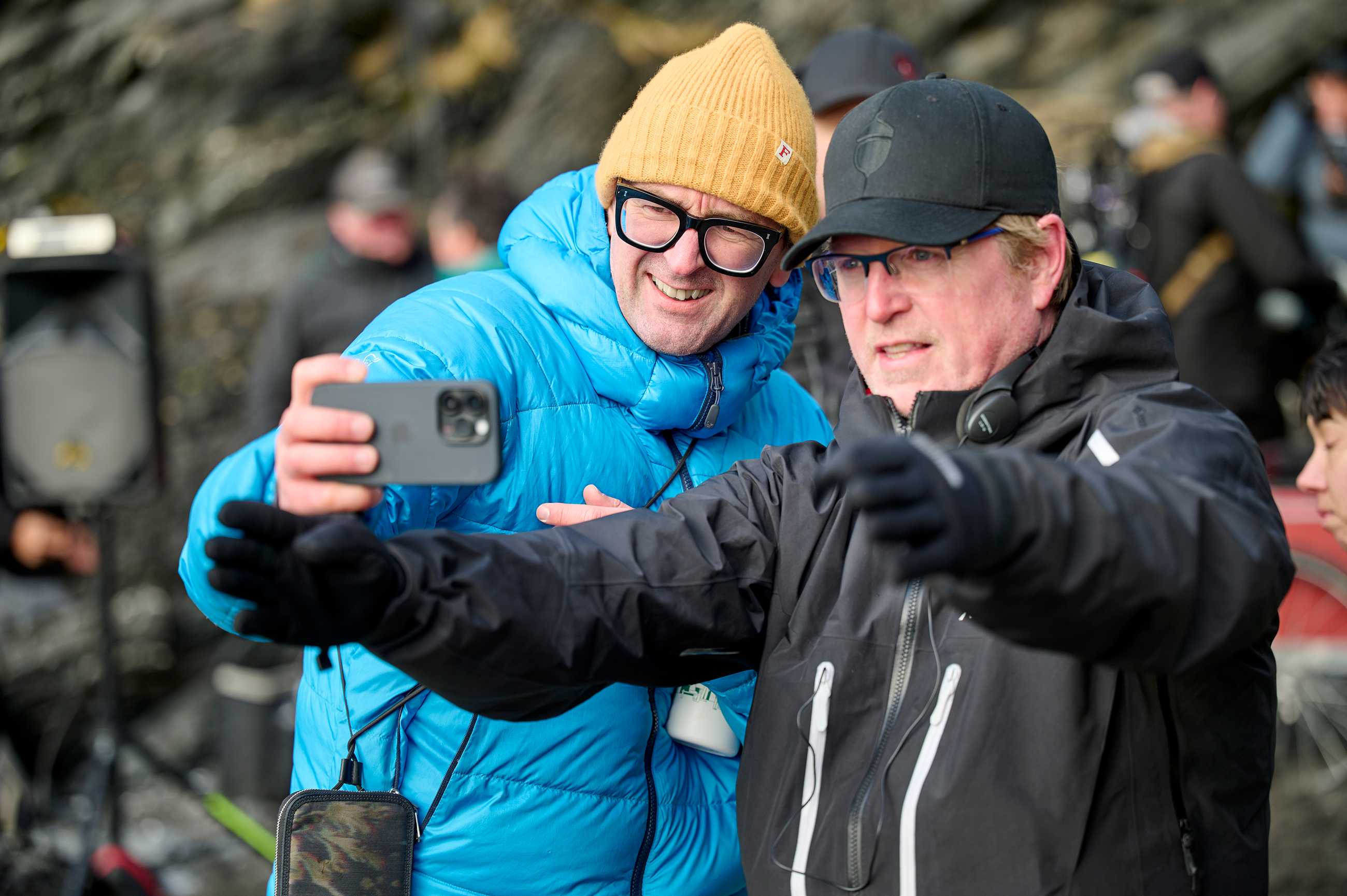 Cinematographer Ole Bratt Birkeland and director Andrew Stanton (right) look through a cellphone's lens on the set of In the Blink of an Eye