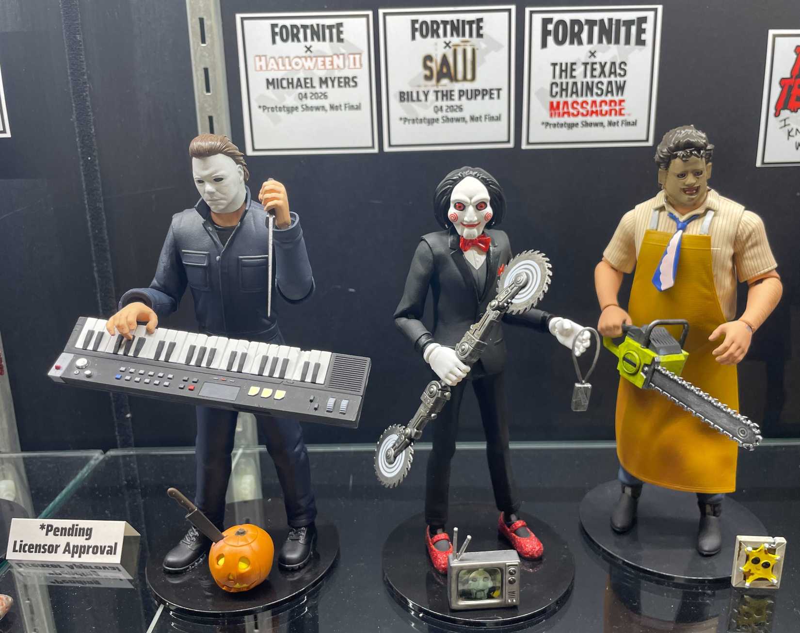 NECAs Figure of horror movie monsters Michael Myers, Billy the Puppet, and Leatherface, as seen in Fortnite