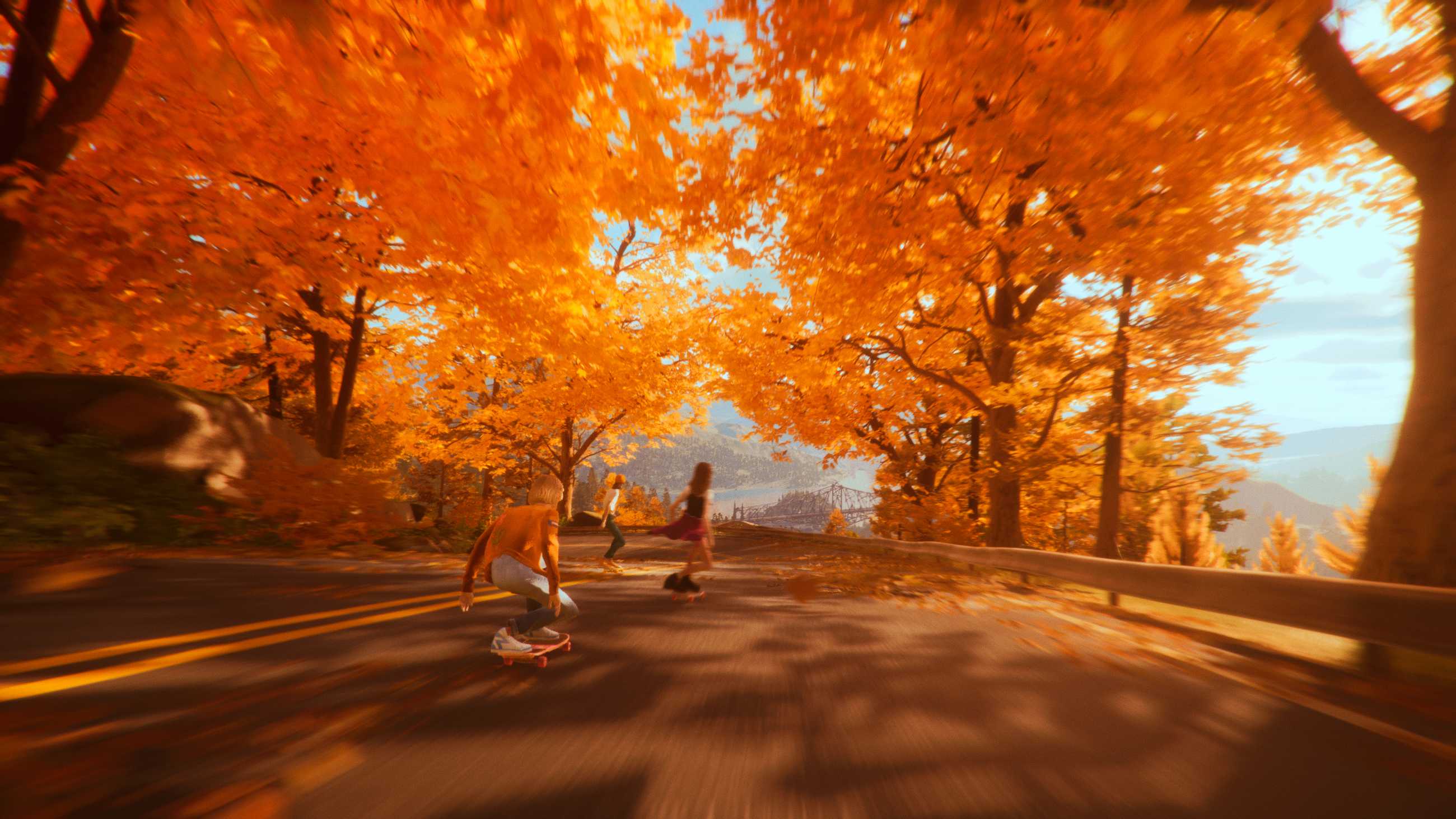 Teens skateboarding under orange autumn trees in a screenshot from Mixtape